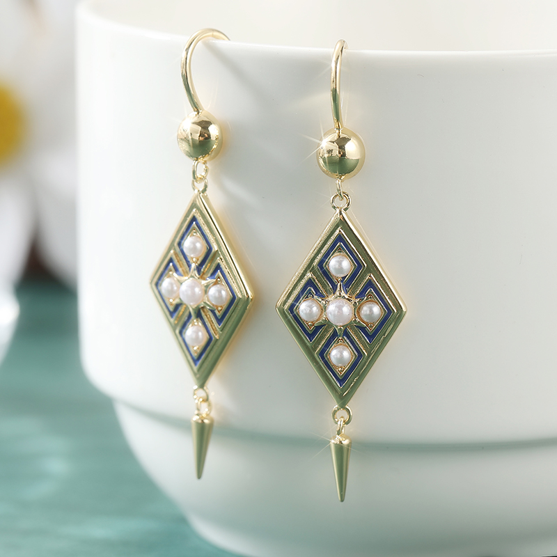 Eleganckie kolczyki z zawieszk – Ethnic Chic Fashion recenzja i cena
